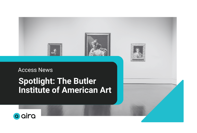 A promotional graphic with a black and white photo of a woman viewing two paintings in an art gallery. She is wearing black pants, a white sweater, and has a black purse. The graphic text at left says "Spotlight: Aira at the Butler Institute." At the right corner are five teal, right angle triangles arranged in a geometric shape.