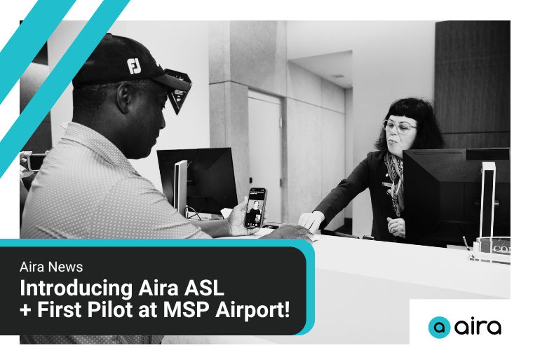 A man stands at a check-in desk looking at his phone, which has an ASL interpreter on screen. A employee stands on the other side of the desk, handing him a room key. Text reads "Aira News—Introducing Aira ASL + First Pilot at MSP Airport." Decorative teal lines at top right and Aira logo in bottom left.