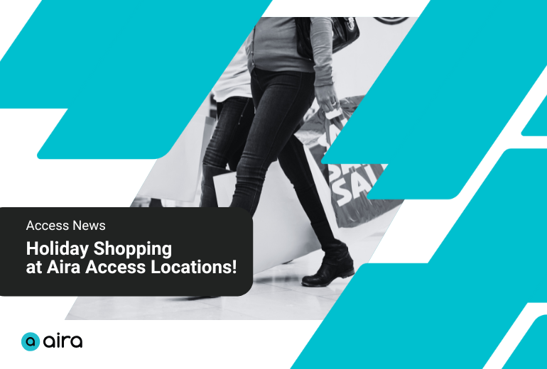 Black and white image of two women walking side by side carrying shopping bags. Decorative teal geometric shapes on left and right. White text on a black background reads, "Access News: Holiday Shopping at Aira Access Locations."